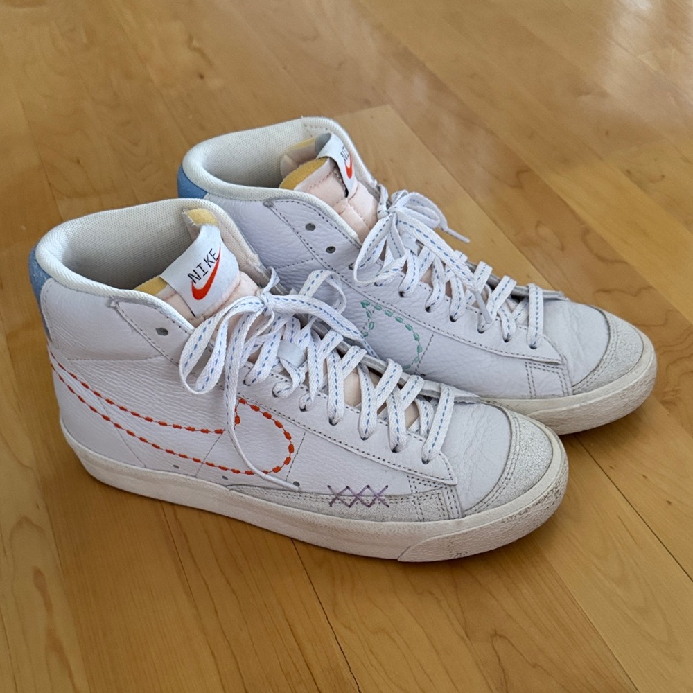 Nike Blazer stitch White with orange, green and blue accents.